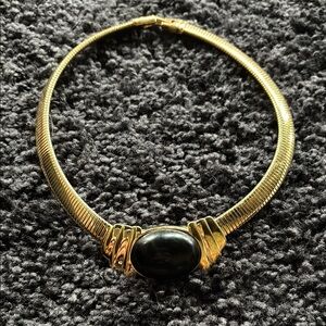 This is a vintage Trifari choker necklace.